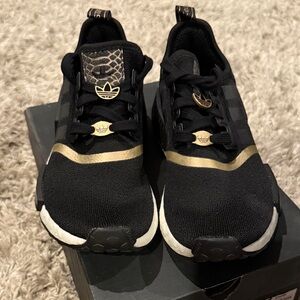Adidas Black Sneakers with Gold Highlights